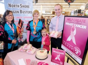  North Shore Dragon Busters Marni Wildman (left) and Sara Jane Roxburgh Walker and daughter Madeline team up with Westview Safeway assistant manager Brenden Gahan for a fund- and awareness-raising campaign held last month. PHOTO PAUL MCGRATH